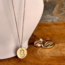 Collier astrologie Gémeaux, acier couleur or Rose