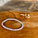 apaisement, douceur, sérénité, tristesse, améliore les relations, générosité, chakra de la gorge, chakra racine 