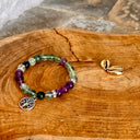 Bracelet Fluorite / Améthyste avec arbre de vie - Mineralshop géométrie sacrée, Améthyste aiderait à lutter contre le stress, les angoisses, la peur et permettre de calmer le mental. fluorite favoriserait la protection pour le psychique.