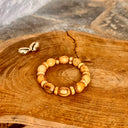 Bracelet élastique Palo Santo perles ovales et donut - Mineralshop éoigne énergies négatives, effet analgésique, purification, protection