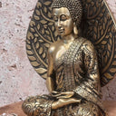 Bouddha méditation avec feuille, couleur or