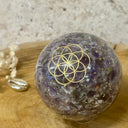 Orgonite sphère améthyste avec Fleur de Vie