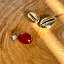 PENDENTIF PIERRE ROULEE DE CORNALINE,  la fécondité, Mineral Shop, purification des fluides corporels, favorise la fertilité chez les femmes et aide à réduire les désagréments liés aux menstruations. Chez les hommes, le carnéol favorise les érections.