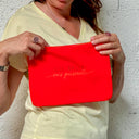 Pochette "Ose, brille, sois puissante !" orange