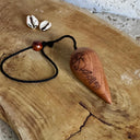 Pendule de Thot en bois artisanal – face symbole – IAMSUBTIL