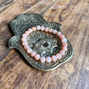 Bracelet boule 06MM PIERRE DE LUNE ROSE A+, la féminité